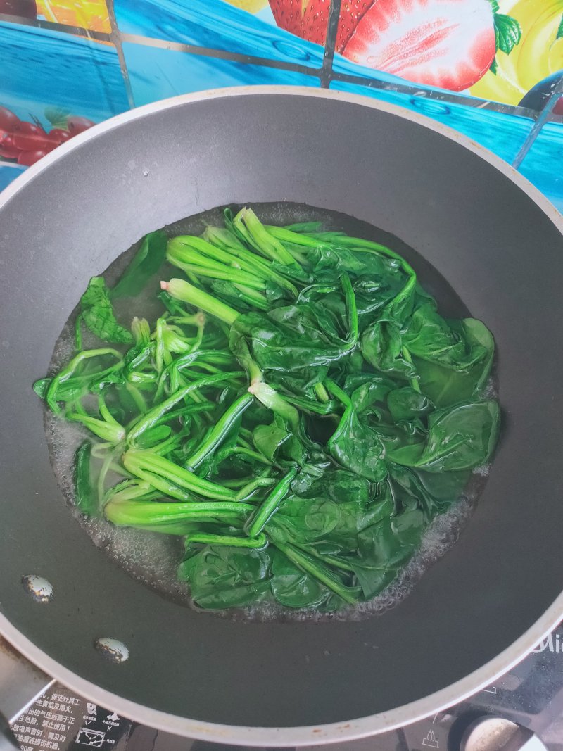 Steps for Cooking Oyster Sauce and Bean Curd Stir-Fried Spinach