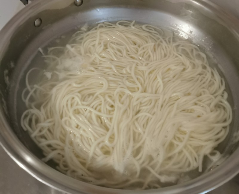 Steps for making Tomato and Zucchini Braised Noodles