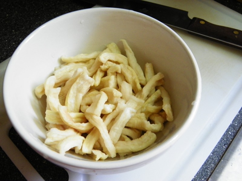 Steps for Making Spicy Stir-Fried Salty Radish with Green and Red Peppers