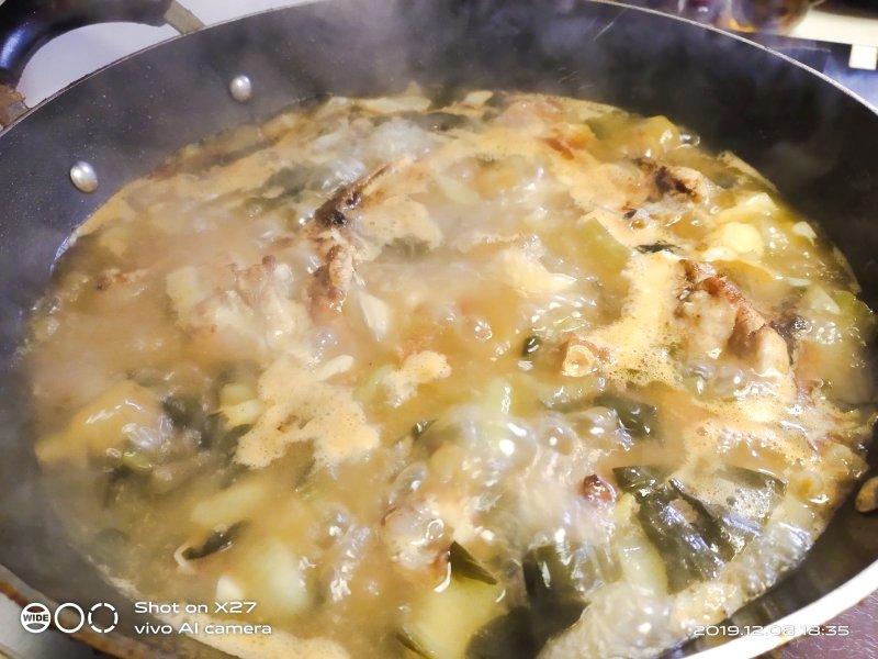 Steps for Cooking Grass Carp and Sour Cabbage Soup