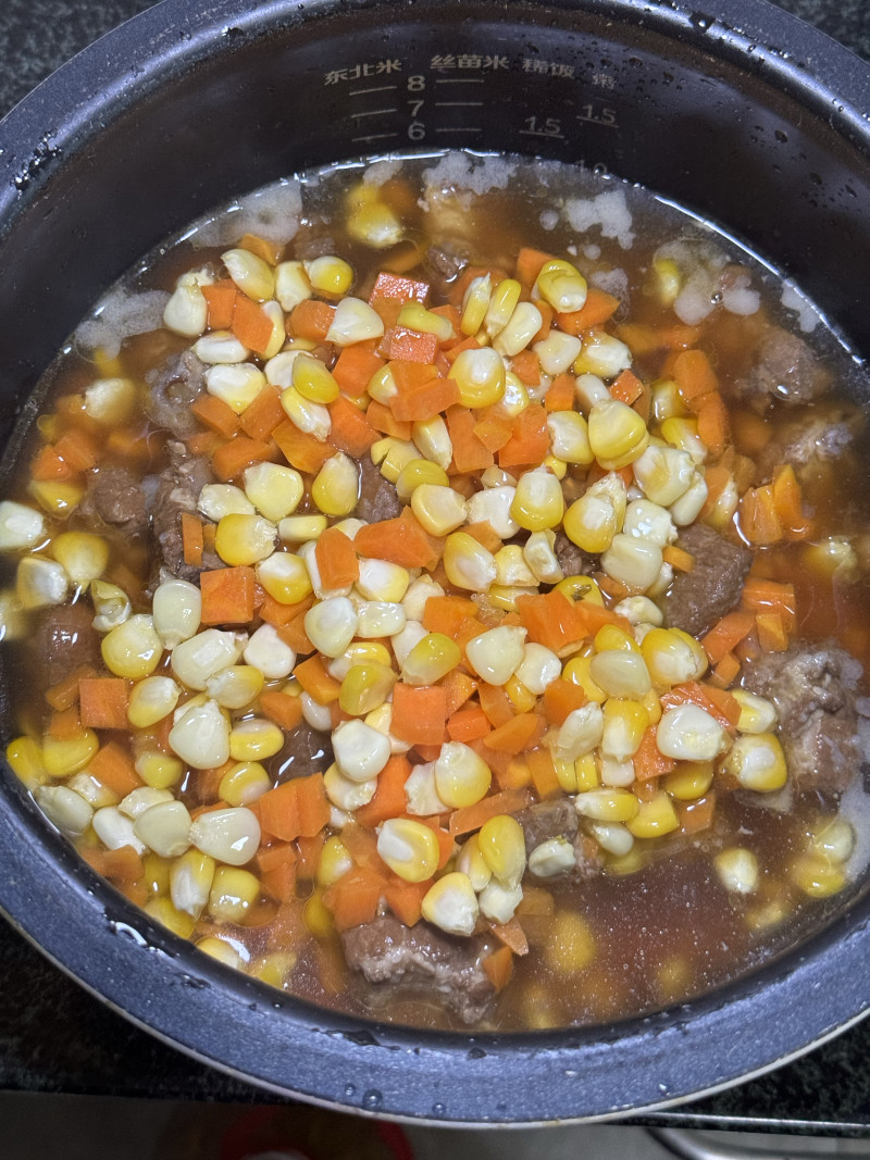Steps for making Carrot Corn Pork Ribs Braised Rice