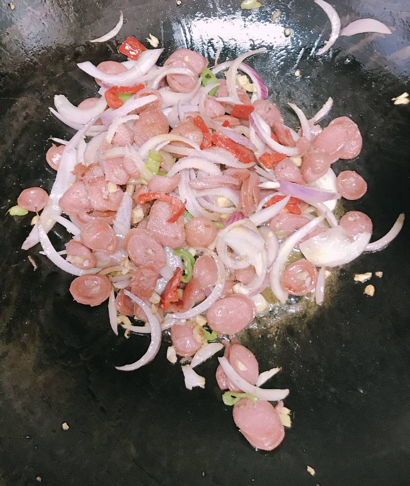 Steps for Cooking Onion Stir-Fried Hot Dogs