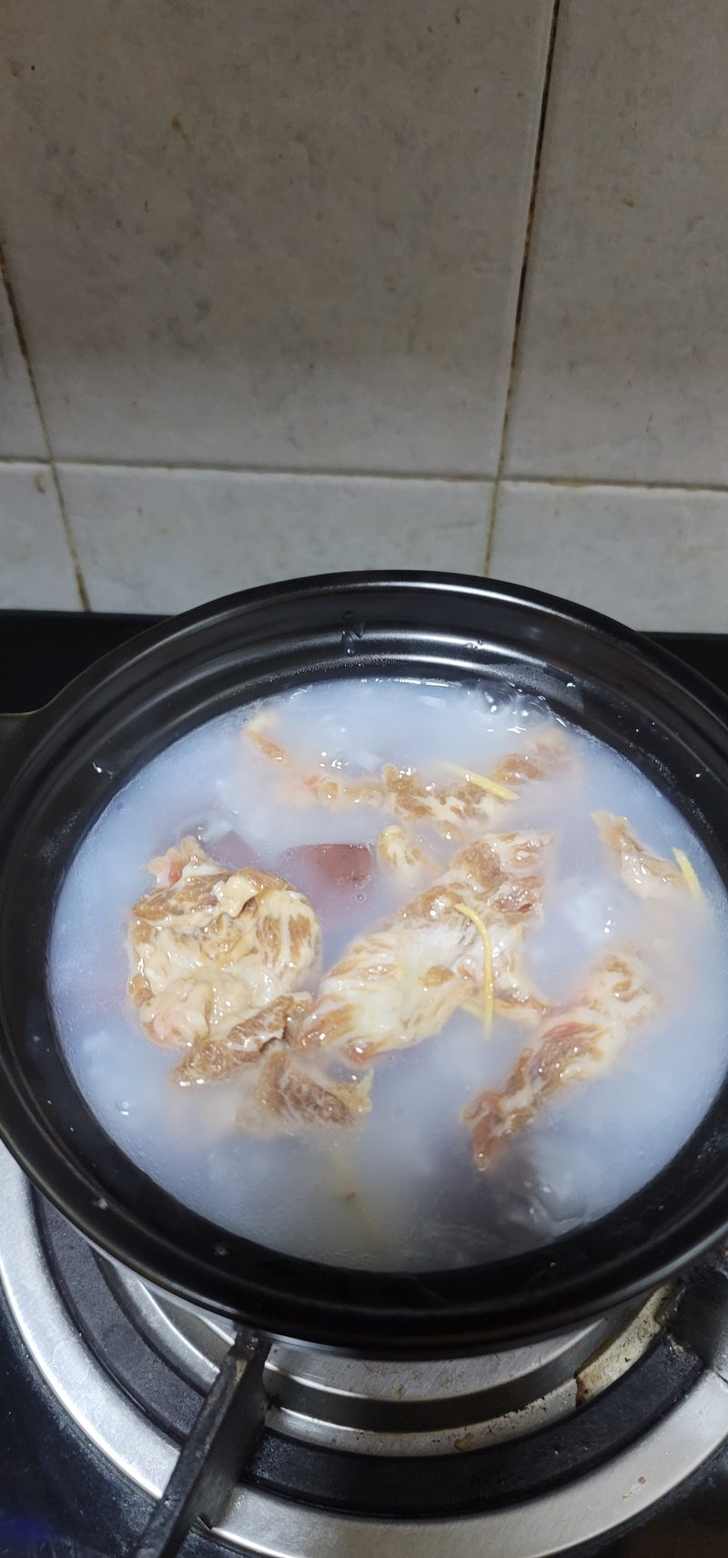 Steps for Cooking Pork and Beef Congee with Chives