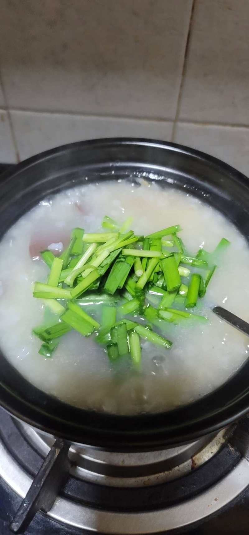 Steps for Cooking Pork and Beef Congee with Chives