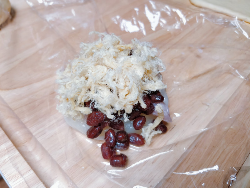 Cooking Steps for Egg Yolk, Pork Floss, Mashed Taro, and Red Bean Bun