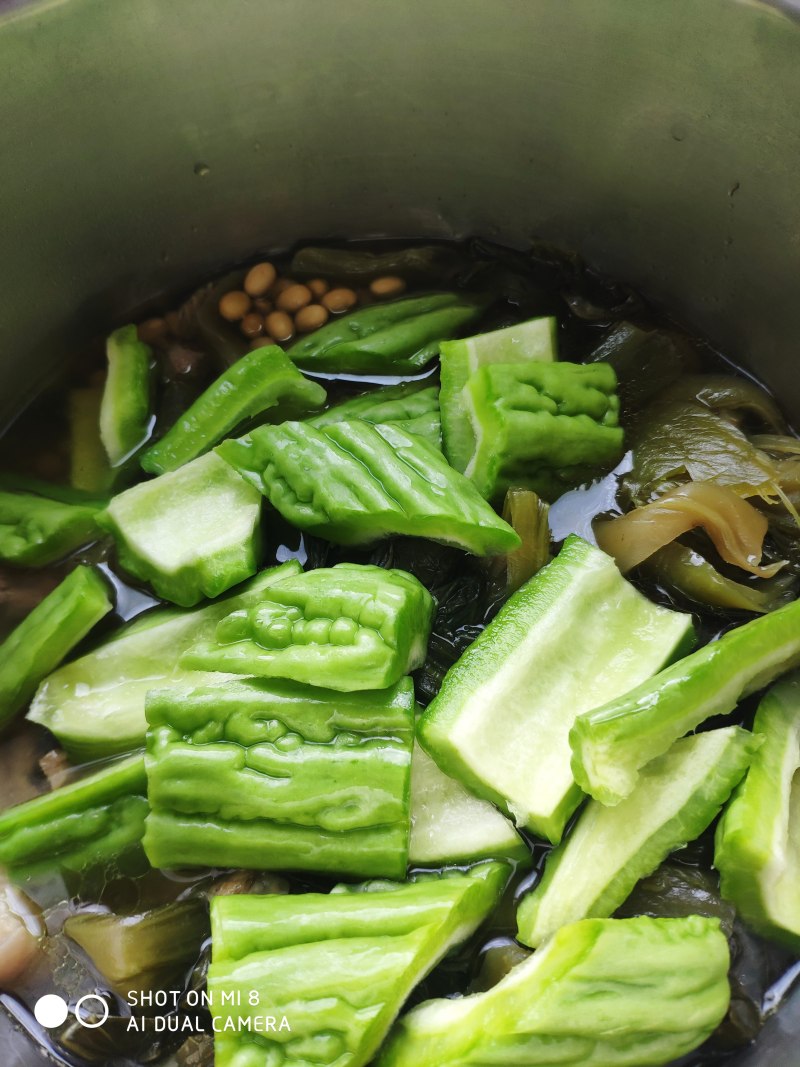 Steps for Cooking Pork Ribs with Salted Vegetables and Bitter Gourd