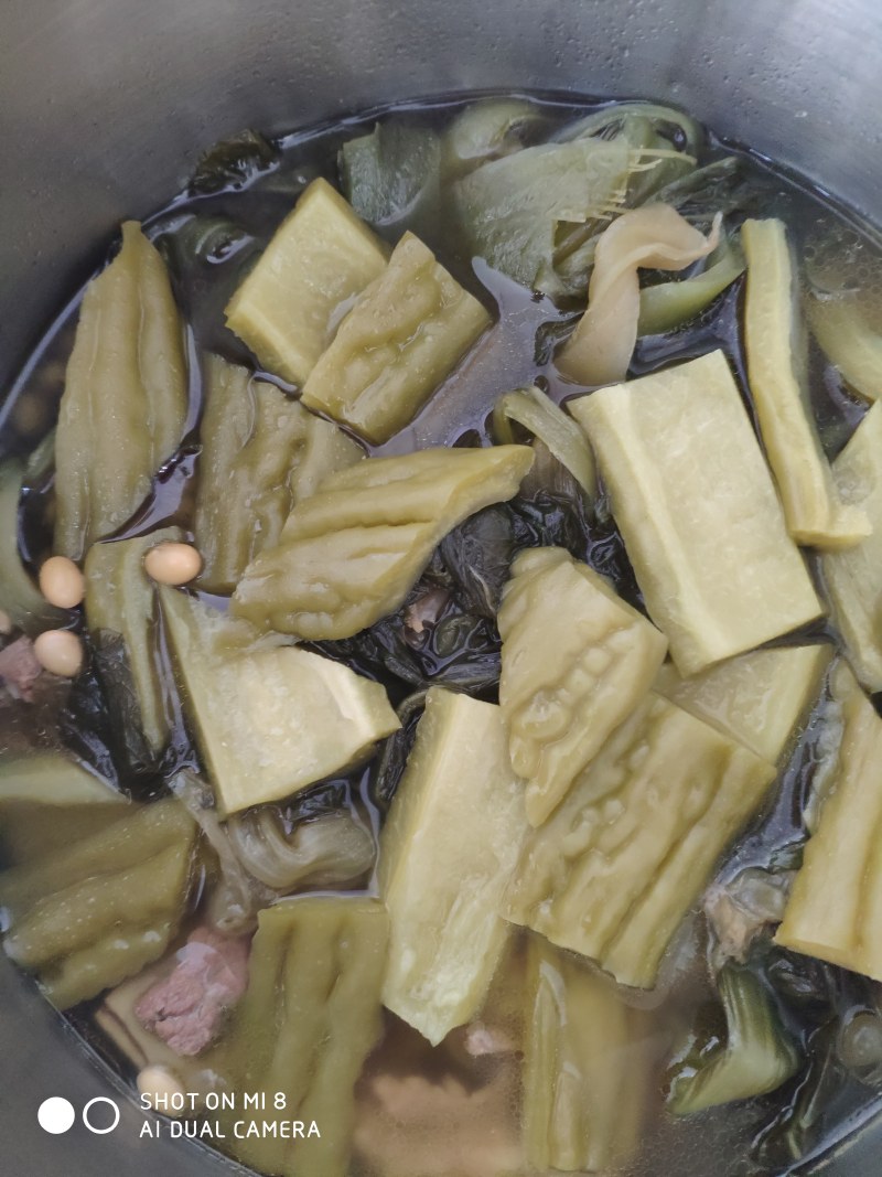 Steps for Cooking Pork Ribs with Salted Vegetables and Bitter Gourd