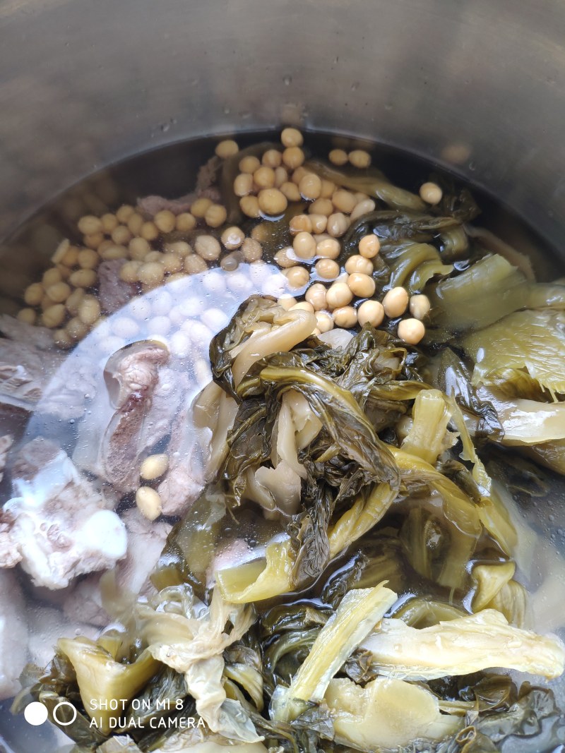 Steps for Cooking Pork Ribs with Salted Vegetables and Bitter Gourd