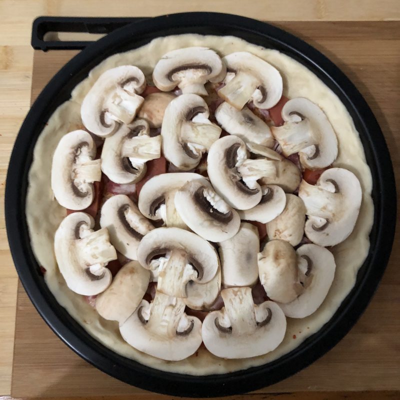 Steps for making Crispy Sausage, Bacon and Mushroom Pizza