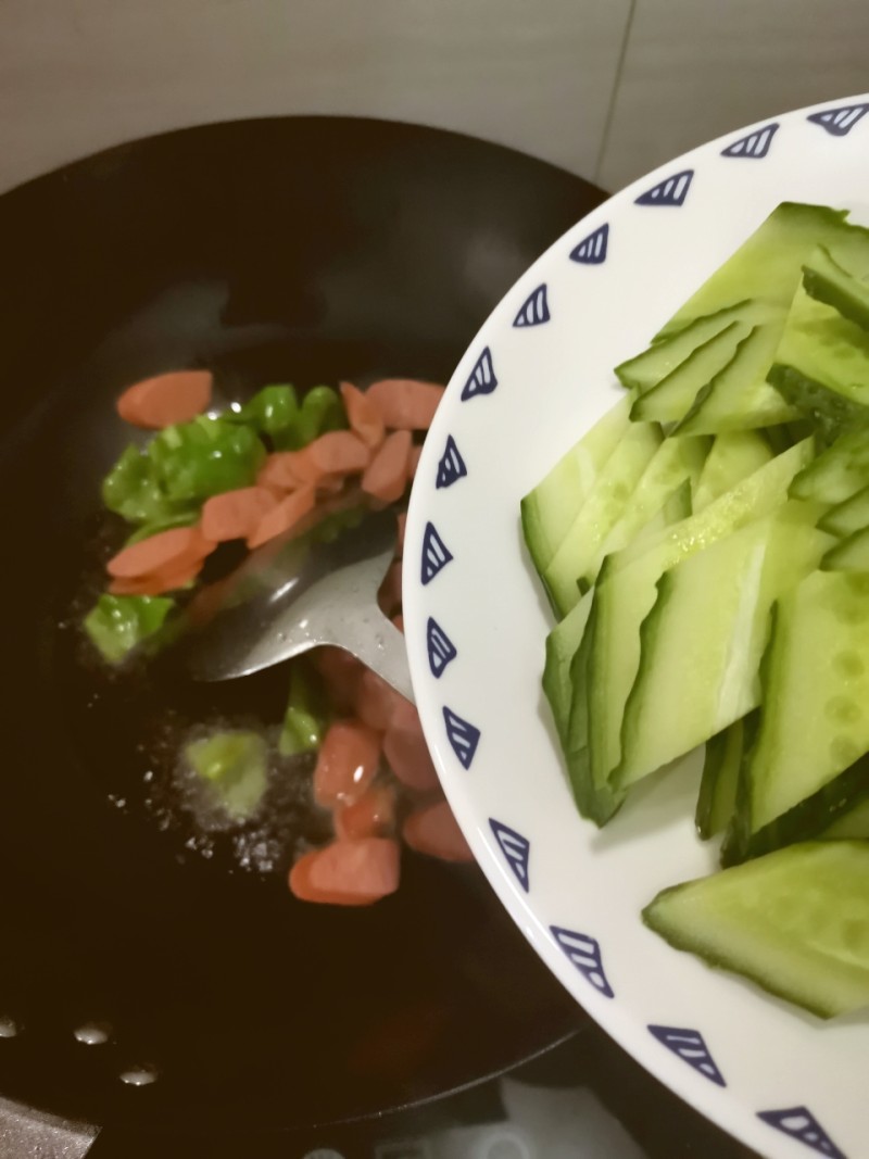 Steps to Cook Cucumber and Hot Dog Stir-Fry