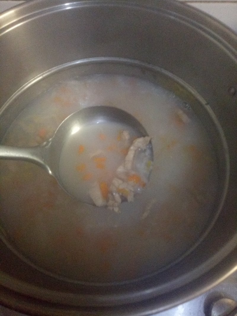 Steps for Making Carrot Lean Pork Congee with Preserved Egg