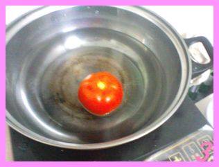 Steps for Cooking Tomato and Egg Drop Porridge