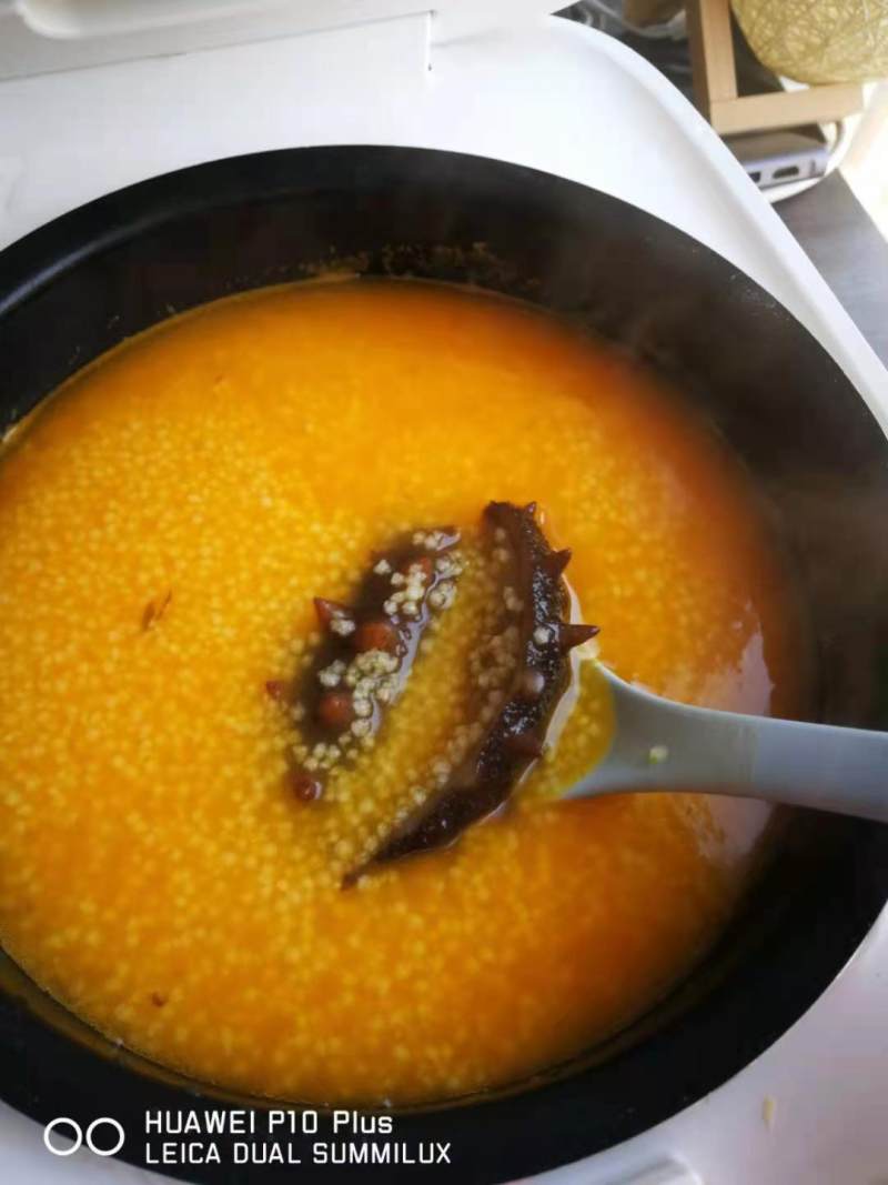 Steps for Cooking Golden Soup Sea Cucumber Millet Porridge