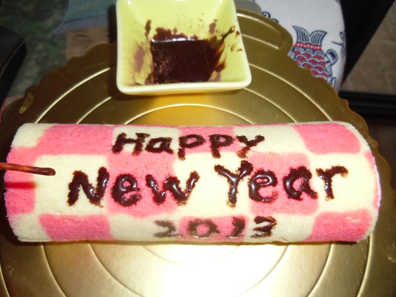 Steps to make New Year's Happy Cake Roll