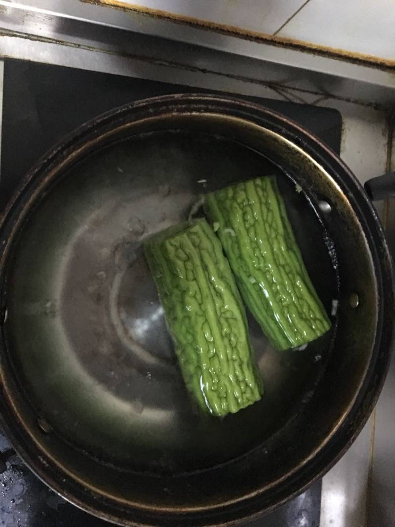 Steps for making Honey Banana Stuffed Bitter Gourd