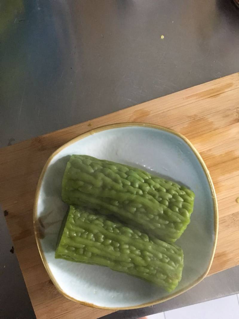 Steps for making Honey Banana Stuffed Bitter Gourd