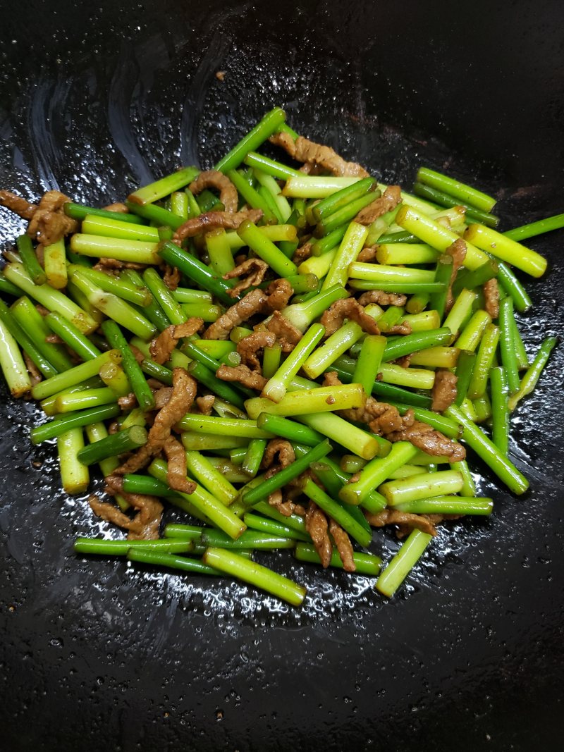 Steps for Cooking Delicious Garlic Shoots Stir-Fried Pork