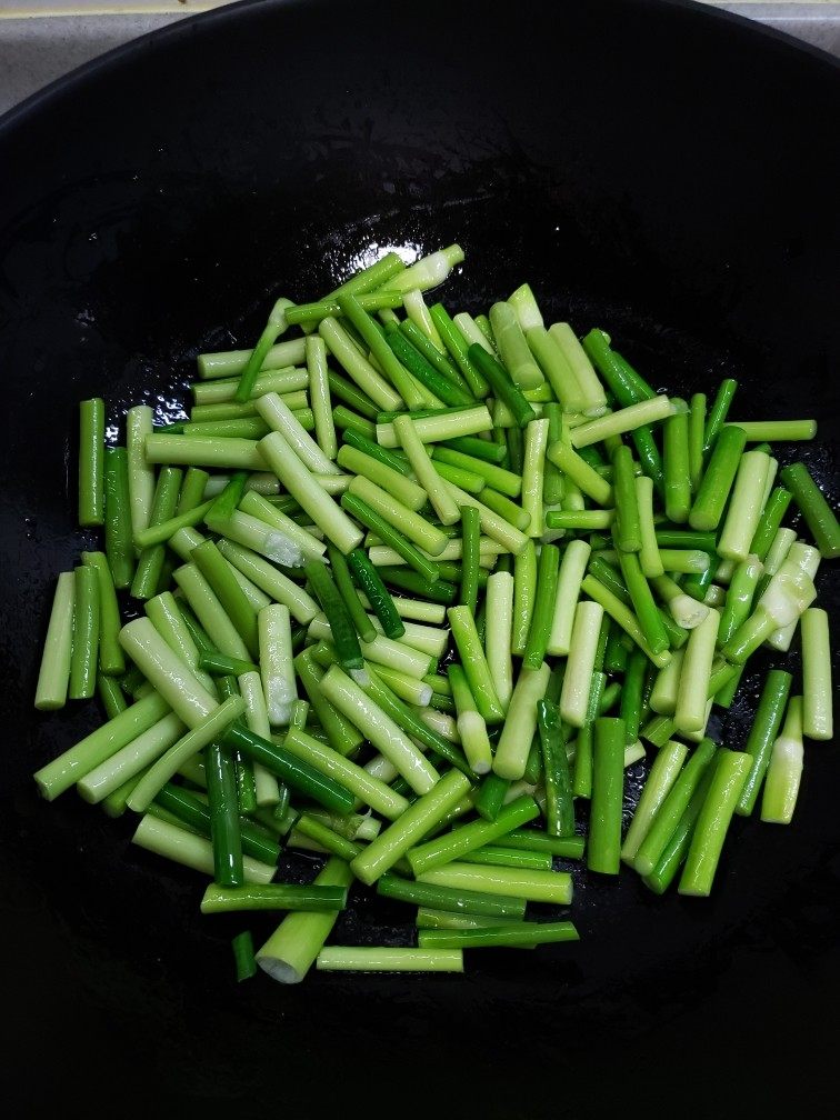 Steps for Cooking Delicious Garlic Shoots Stir-Fried Pork