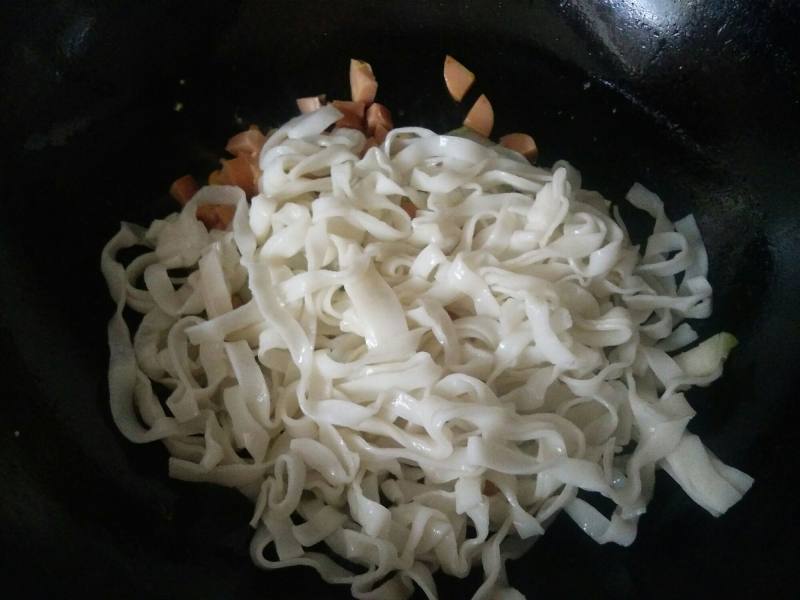 Steps to Cook Cabbage and Hot Dog Stir-Fried Rice Noodles